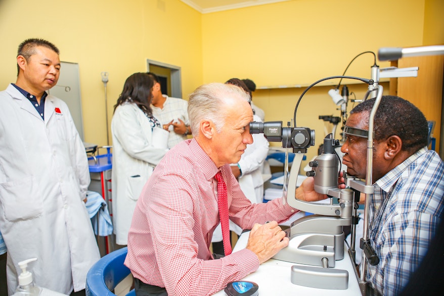 patient getting screened by doctor