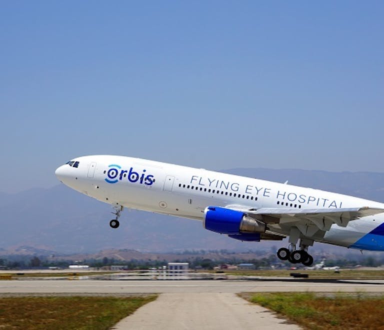 Md 10 2016 C Orbis N Asia Left Side Whole Plane Exterior Takeoff