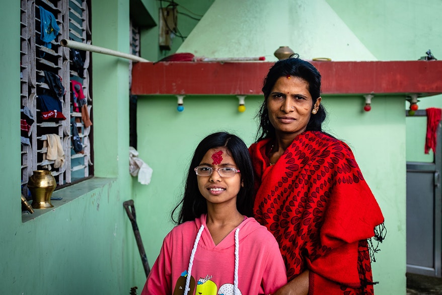 Orbis End of Year Appeal: Megha pictured with her mom and her new glasses which have helped her poor vision