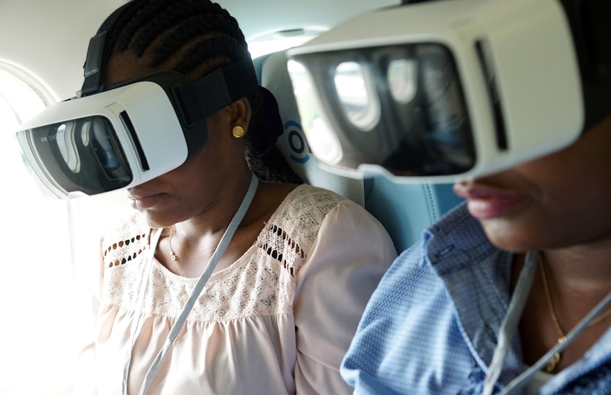 Woman receives eye examination.