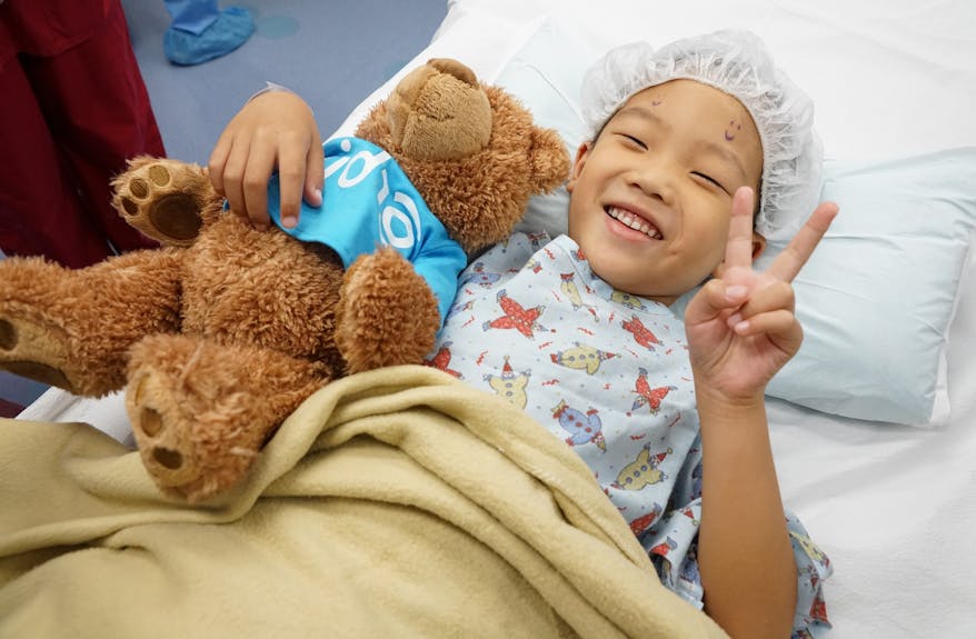 Zhang Yu Gao, age 5, waited for strabismus surgery on the Flying Eye Hospital