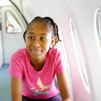 Savynna waits for surgery on our Flying Eye Hospital to correct her squint