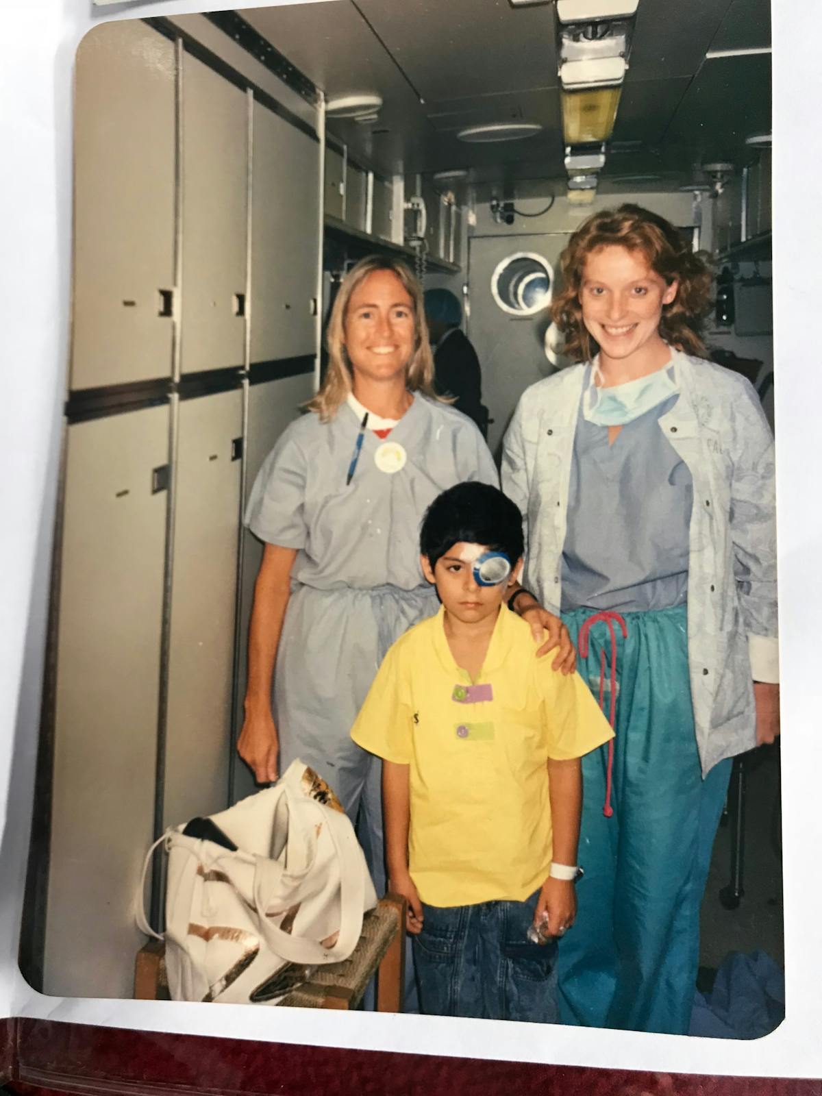 Orbis nurses with young patient.