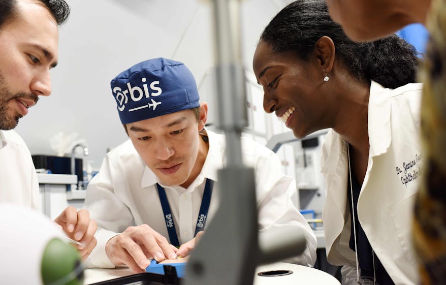 Orbis Flying Eye Hospital first time volunteer faculty Dr. Bradford Lee training local eye care teams